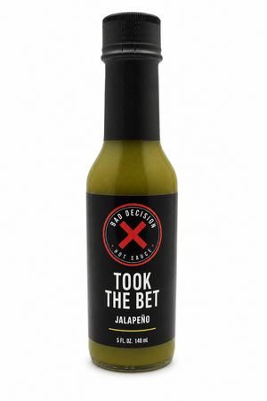Took The Bet jalapeño hot sauce 5 oz bottle on a white background