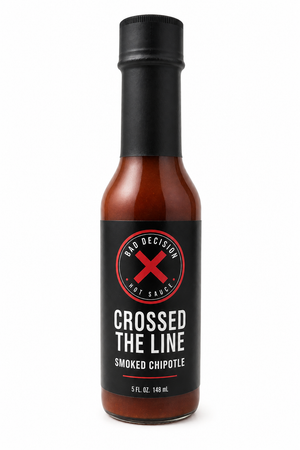 Crossed The Line smoked chipotle hot sauce 5 oz bottle on a white background