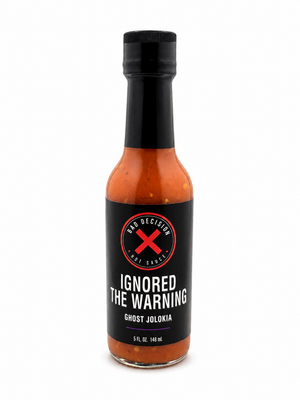 Ignored The Warning ghost jolokia hot sauce 5 oz bottle on a white background